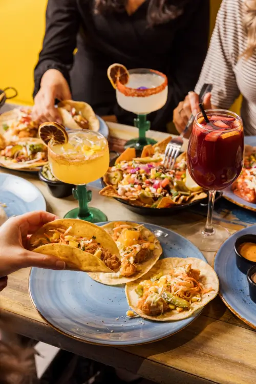 Friends enjoying Mexican food